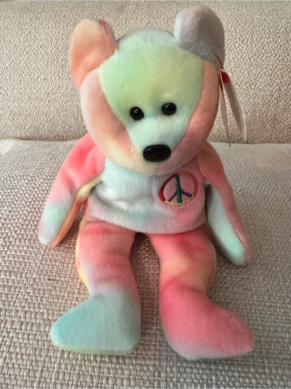TY beanie baby rainbow peace teddy bear w tag. “Peace”